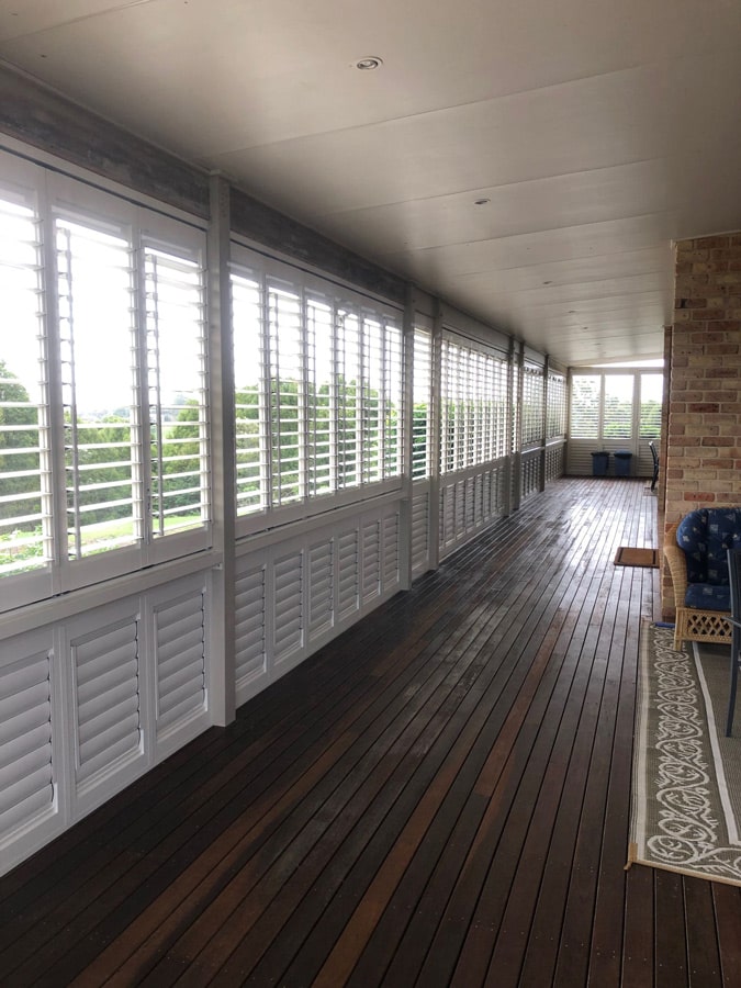 White Outdoor Shutter Along Hallway — Timber Tec Shutters In Ballina, NSW