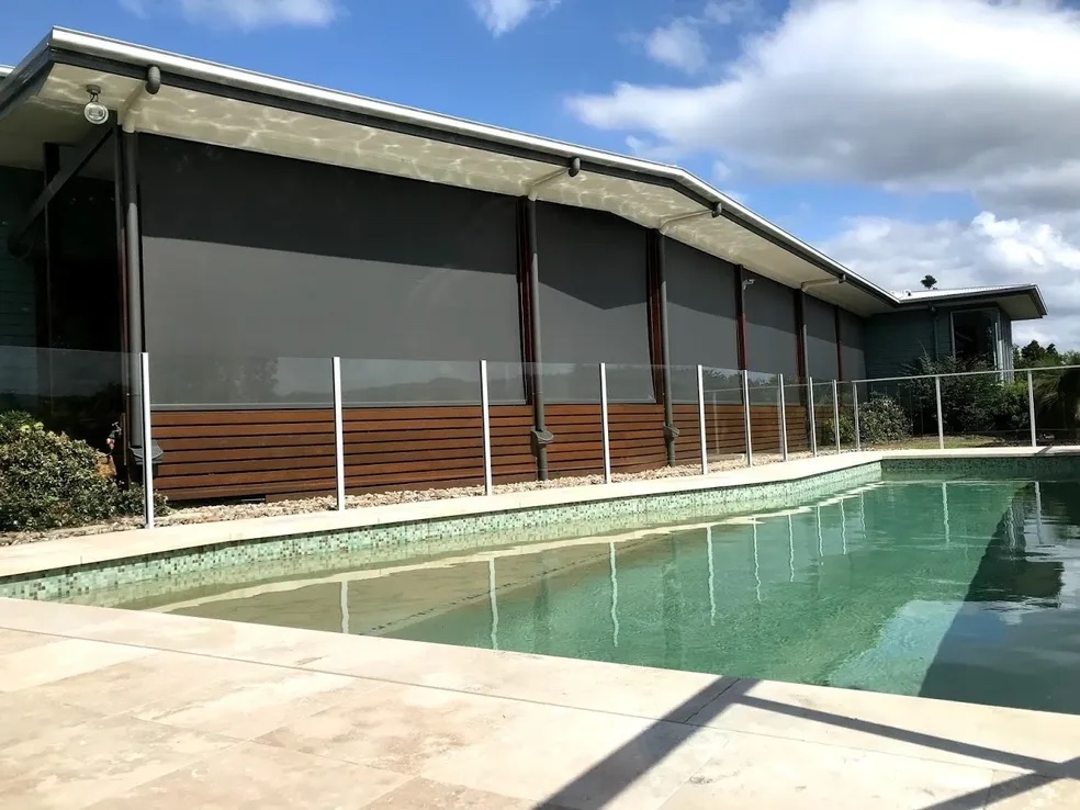 Dark Awning by the Pool — Timber Tec Shutters In Ballina, NSW