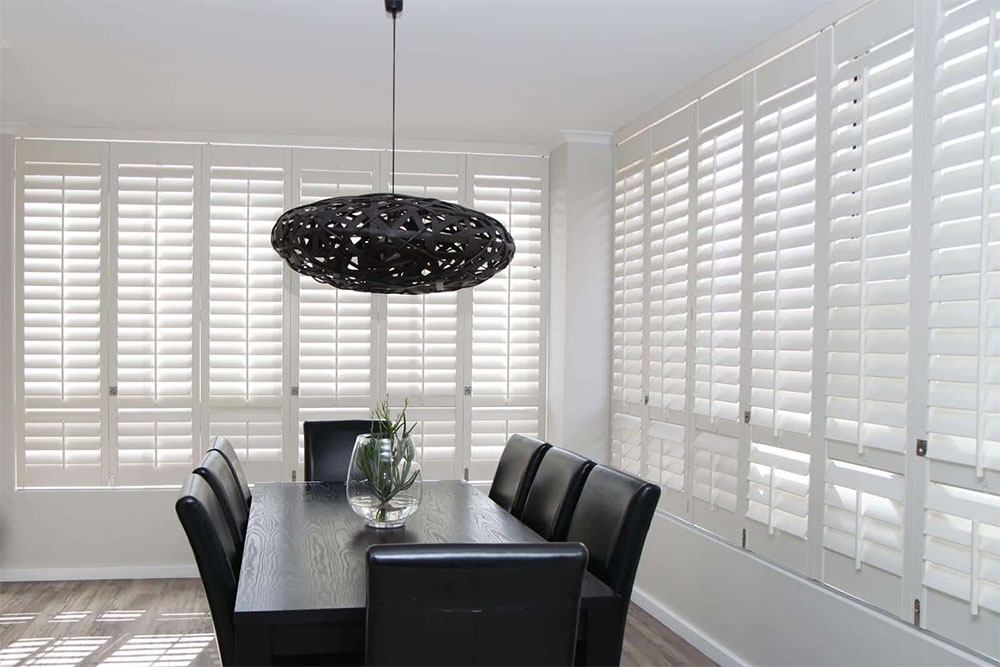 Large Living Room with Plantation Shutters — Timber Tec Shutters In Ballina, NSW